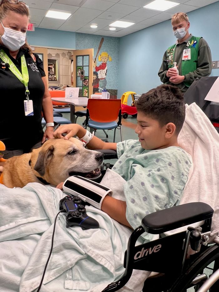 patient Michael with facility dog