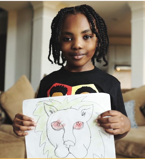 patient zion holding picture