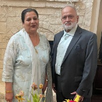 Memorial Hermann Rehabilitation Hospital-Katy patient, Ahmed Vaid, stands proudly with his wife following treatment.