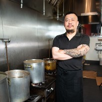 Memorial Hermann Rehabilitation Hospital - Katy patient, Yen Lang, returns to work in his kitchen.