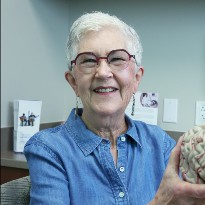 patient phyllis lair holding brain