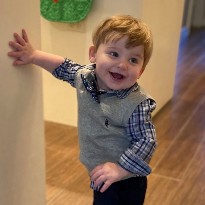 Walter smiling while walking