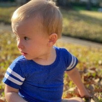 Andrew outside smiling