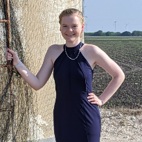 Spinal Cord Injury patient Abbi Evans dons a prom dress following successful rehabilitation.
