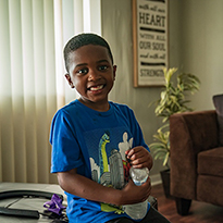 Young stroke patient, Major Hudlin, poses for a photo.