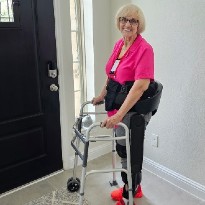 TIRR Memorial Hermann patient, Shirley Crump, shows off her exoskeleton.