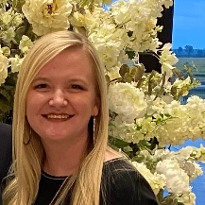 TIRR Memorial Hermann patient, Sierra, stands after rehabilitation.