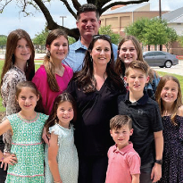 Marrissa Miller, LifeFlight patient, stands with her family after recovery.