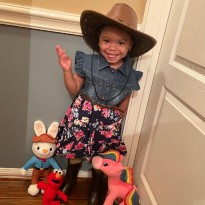 Sutton with her toys