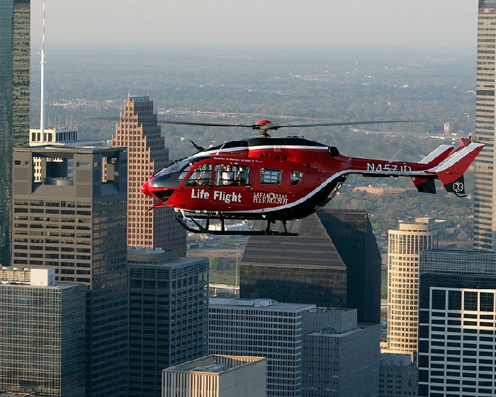 The Memorial Hermann Life Flight Helicopter flies through the skies of Houston, Texas.