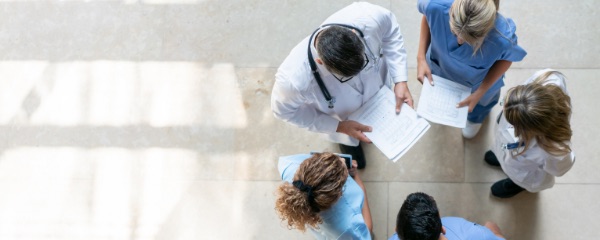 Overhead shot of physicians in a circle