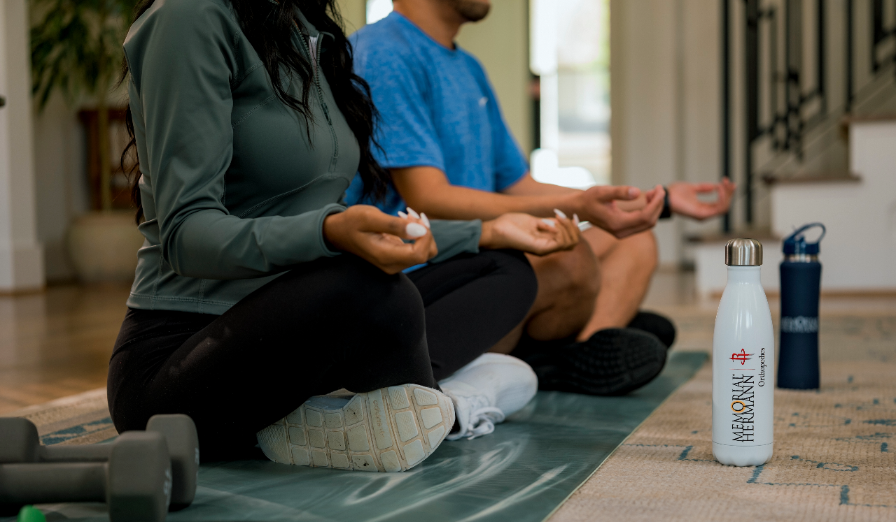 Two people meditating