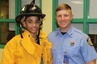 Firefighter and patient Children's Memorial Hermann