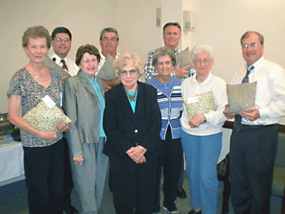 Church Members holding Cough Pillows