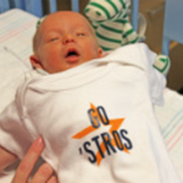 Baby in astros gear