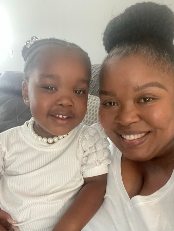 patient emory smiles with mom