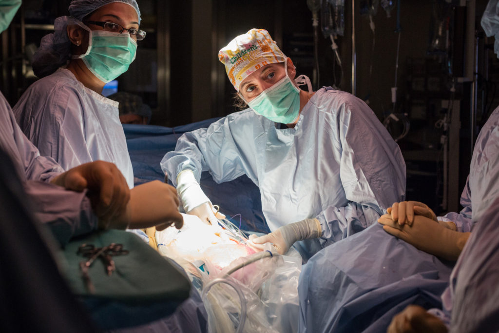 Dr. Mary Austin opening uterus in surgery