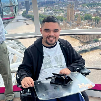 Former TIRR Memorial Hermann patient, Angel Moldonado, smiles on his travels.