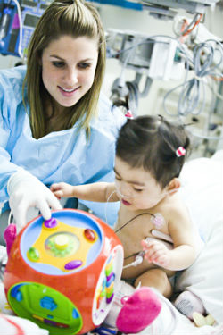 Child Life Specialist with Patient