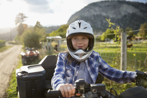 Child riding on an ATV