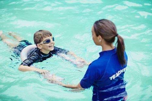 Boy swimming lesson