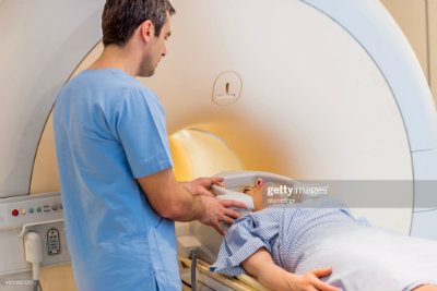 Female Patient on MRI Machine