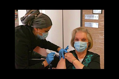 A post-polio patient receives COVID-19 vaccination provided by TIRR Memorial Hermann.