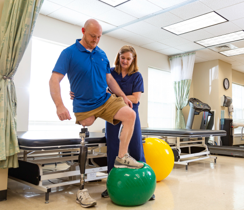 A TIRR Memorial Hermann patient practices balancing with Osseointegration.