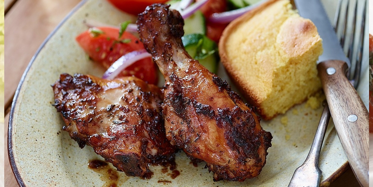 Chicken on plate with bread