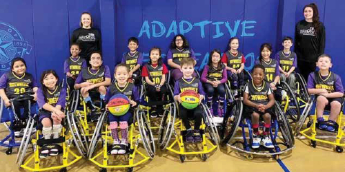 The pediatric adaptive sports team and their coaches.