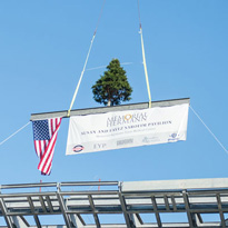 Raising banner for topping out ceremony